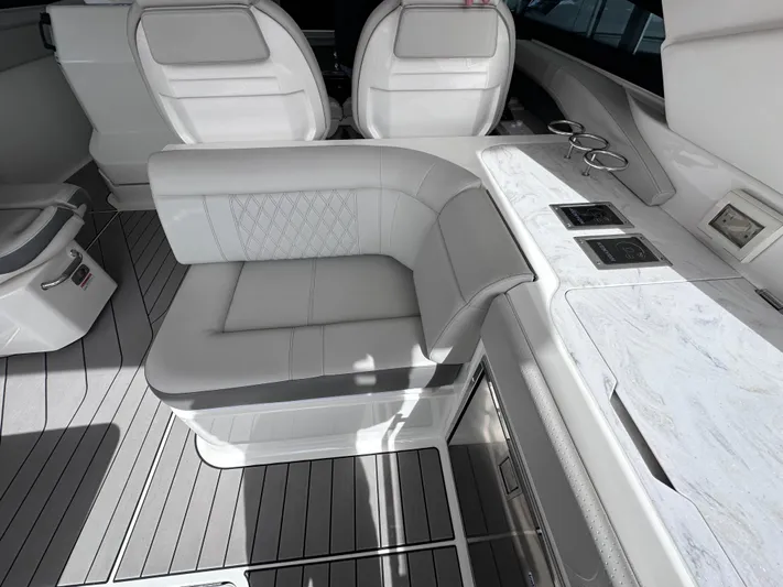  Yacht Photos Pics Luxurious interior of 2023 Sea Ray SLX 400 OB with elegant seating and modern design.