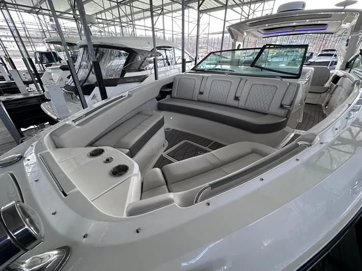  Yacht Photos Pics 2023 Sea Ray SLX 400 OB luxury boat interior with spacious seating and modern design.