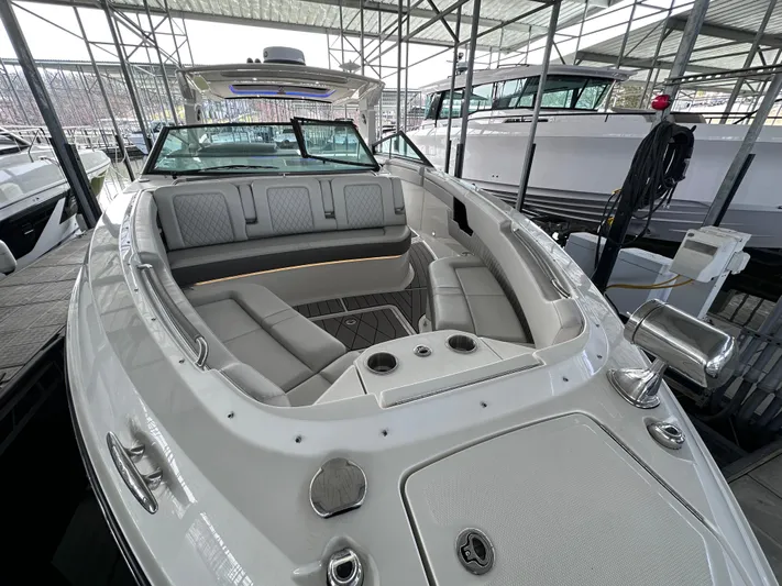  Yacht Photos Pics 2023 Sea Ray SLX 400 OB luxury boat interior with spacious seating and modern design.
