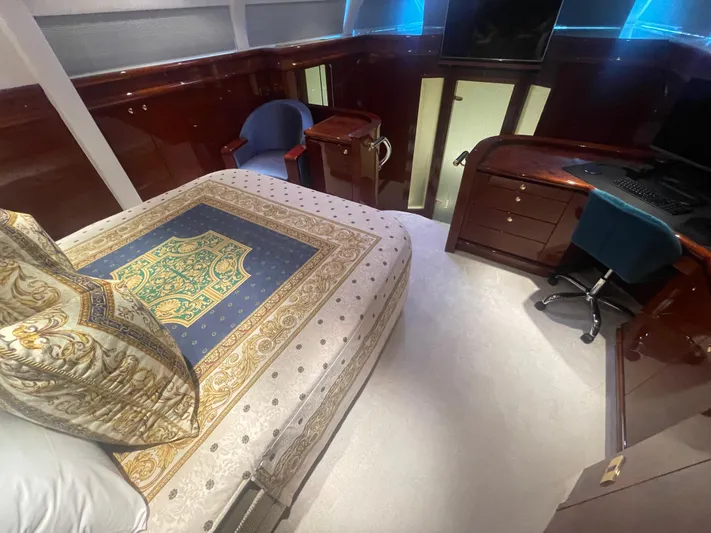 Sarah Sea Yacht Photos Pics Luxurious bedroom interior of 2004 Kaiserwerft Baron 102 yacht with elegant decor and furnishings.