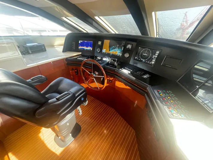 Sarah Sea Yacht Photos Pics Luxurious helm of 2004 Kaiserwerft Baron 102 yacht with advanced navigation systems and leather captain's chair.