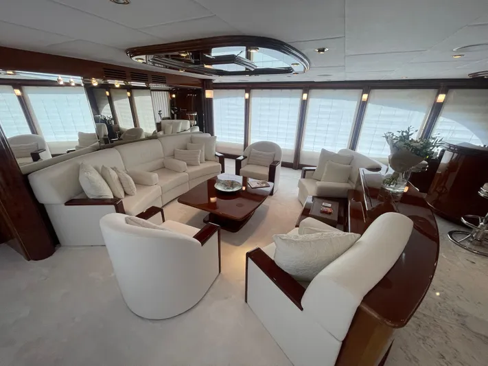 Sarah Sea Yacht Photos Pics Luxurious interior of 2004 Kaiserwerft Baron 102 yacht with elegant seating and decor.