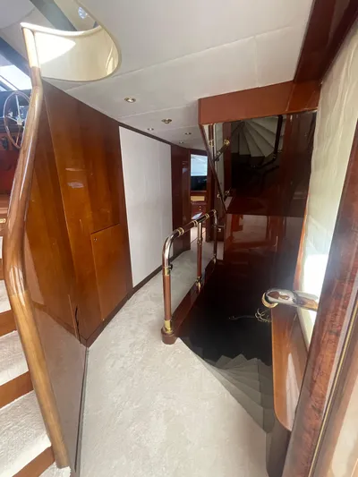 Sarah Sea Yacht Photos Pics Interior of 2004 Kaiserwerft Baron 102 yacht with wooden stairs and elegant design.