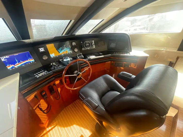 Sarah Sea Yacht Photos Pics Luxurious helm of 2004 Kaiserwerft Baron 102 yacht with modern navigation equipment.