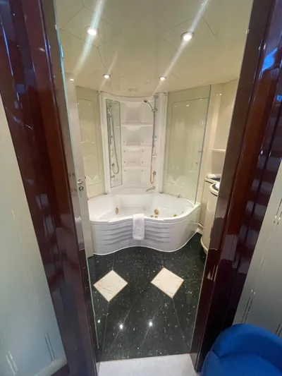 Sarah Sea Yacht Photos Pics Luxurious bathroom on 2004 Kaiserwerft Baron 102 yacht with modern fixtures and elegant design.