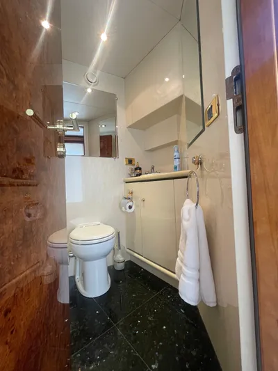 Sarah Sea Yacht Photos Pics Luxurious bathroom on 2004 Kaiserwerft Baron 102 yacht with modern fixtures and elegant design.