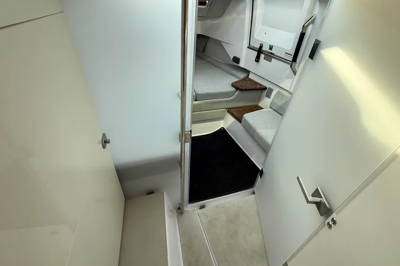 Raven Yacht Photos Pics Interior cabin of 2021 Axopar 37 XC CROSS CABIN with modern seating and steps.