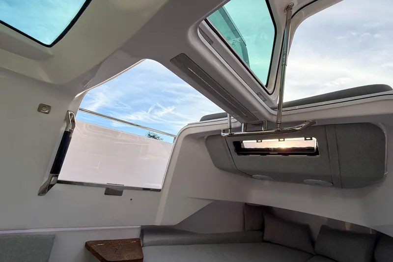 Raven Yacht Photos Pics Interior view of 2021 Axopar 37 XC CROSS CABIN with skylight and modern design.