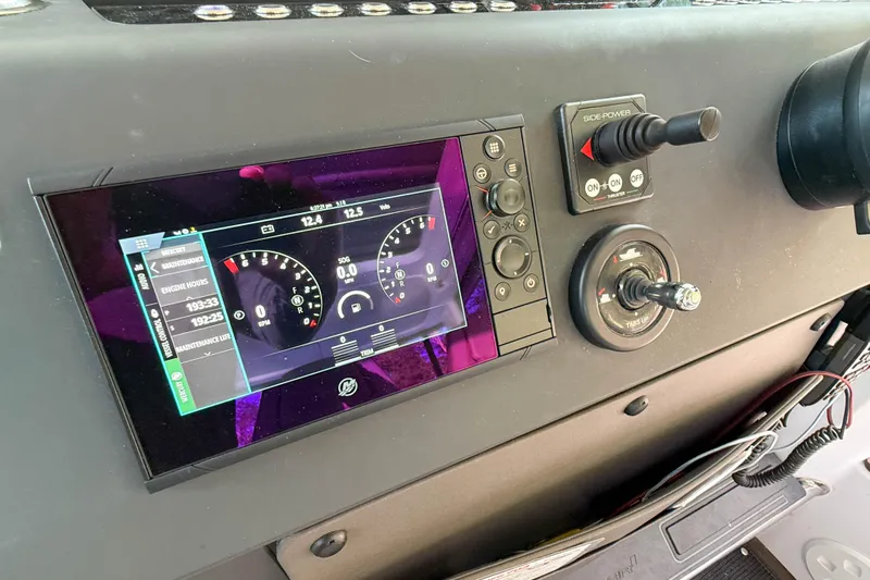 Raven Yacht Photos Pics Dashboard of 2021 Axopar 37 XC CROSS CABIN with digital display and controls.