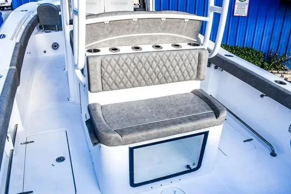  Yacht Photos Pics 2025 Sea Hunt Gamefish 28 Forward Seating boat interior with cushioned seating and rod holders.