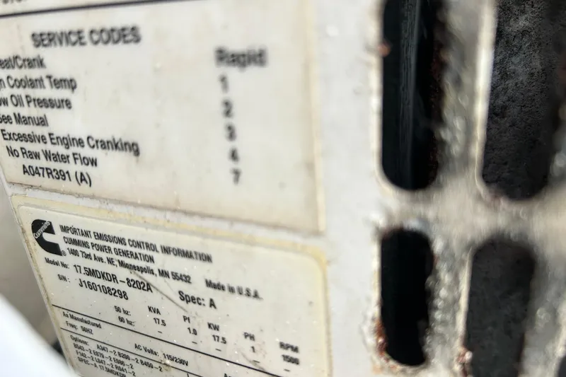 Neverland Yacht Photos Pics Close-up of service codes and emissions label on a 2018 Fountaine Pajot Catamaran 67.