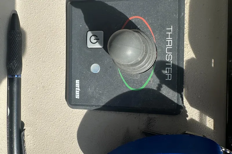 Sandman Yacht Photos Pics Control panel of a 2001 Cruisers Yachts 3870 Express with thruster joystick.