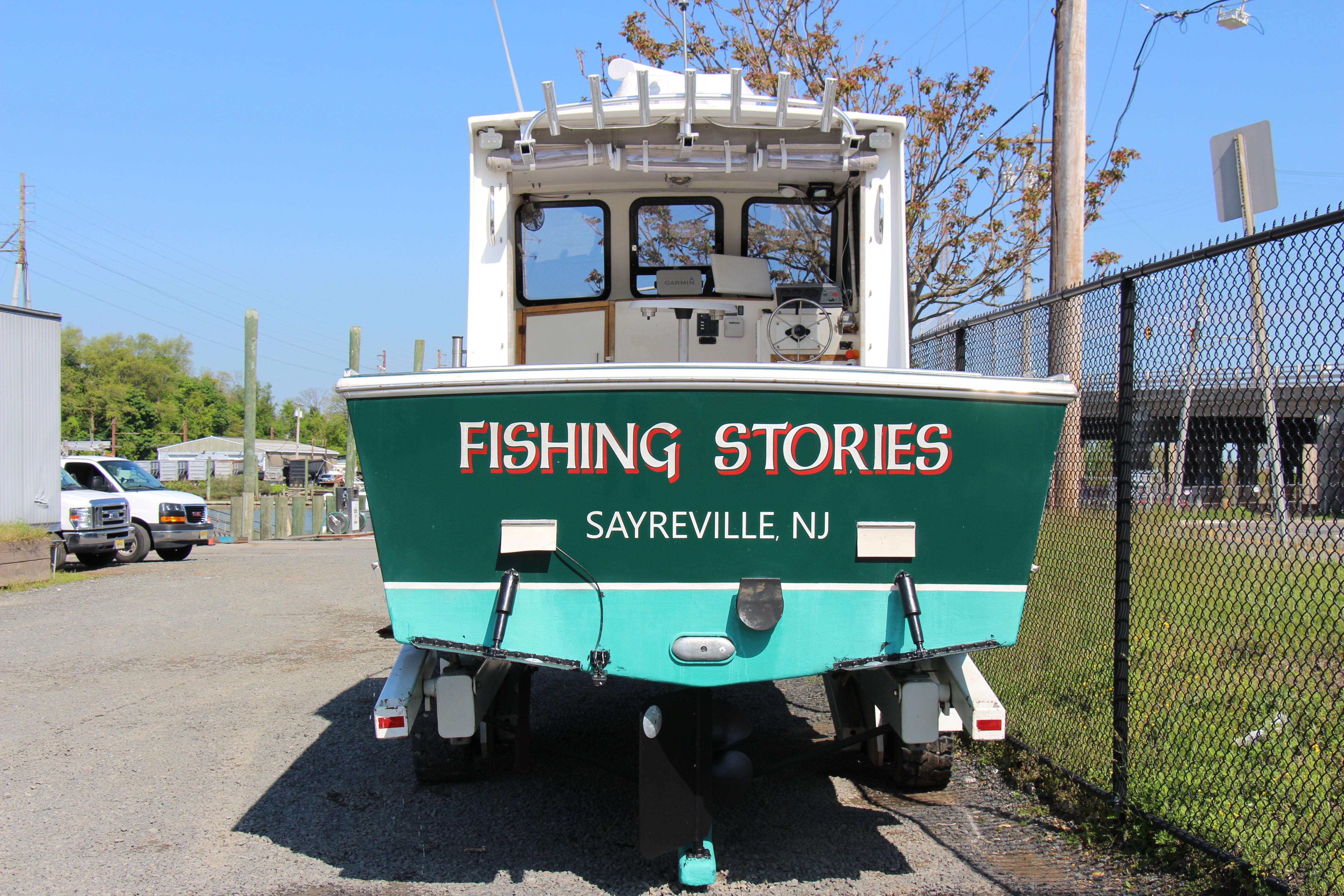 Custom Alley Boats 28 Downeast 2009, Fishing Stories, Sayreville NJ, docked on a trailer.
