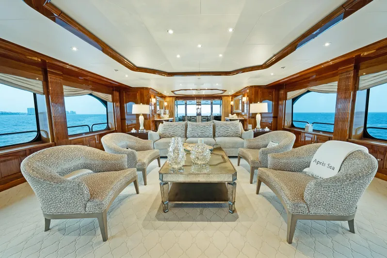 Silver Lining Yacht Photos Pics Luxurious interior of 2016 Christensen Tri-Deck yacht with elegant seating and ocean views.