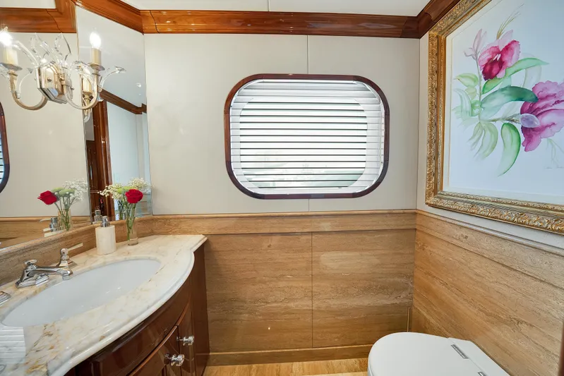 Silver Lining Yacht Photos Pics Luxurious bathroom on 2016 Christensen Tri-Deck yacht with elegant decor and floral artwork.