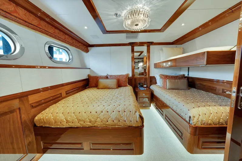 Silver Lining Yacht Photos Pics Luxurious 2016 Christensen Tri-Deck yacht bedroom with elegant wood finishes and plush bedding.