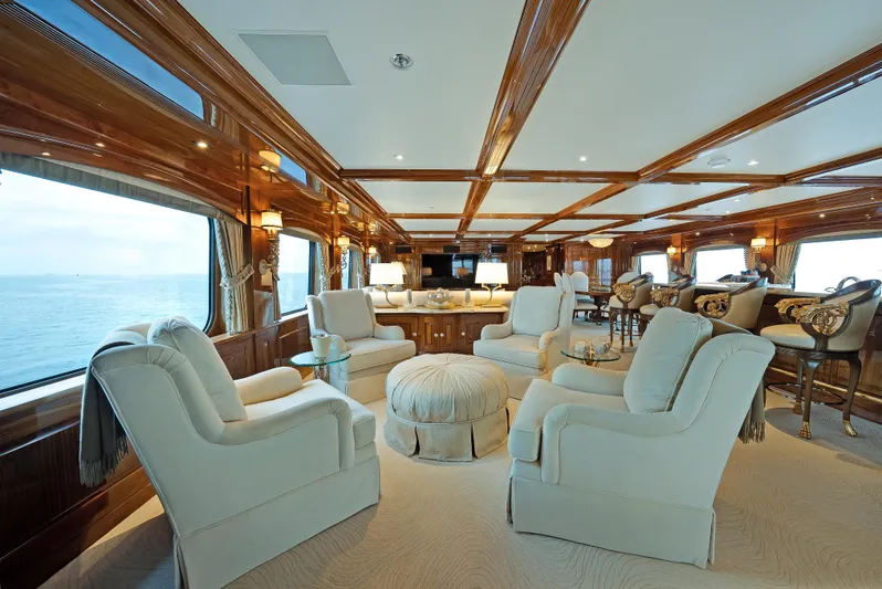 Silver Lining Yacht Photos Pics Luxurious interior of 2016 Christensen Tri-Deck yacht with elegant seating and ocean views.