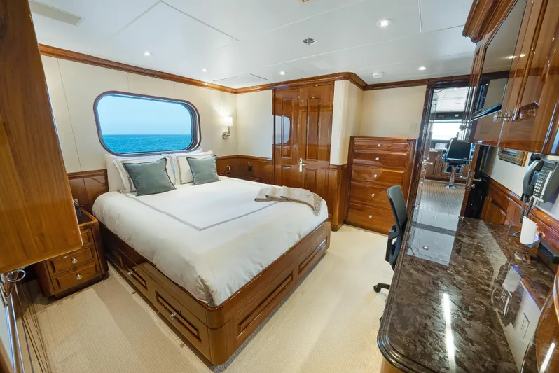 Silver Lining Yacht Photos Pics Luxurious bedroom interior on 2016 Christensen Tri-Deck yacht with ocean view.