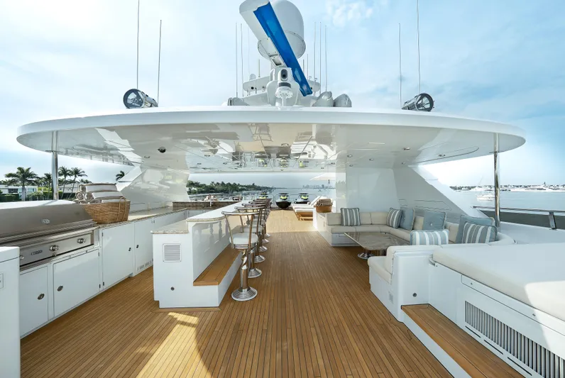 Silver Lining Yacht Photos Pics Luxurious 2016 Christensen Tri-Deck yacht with spacious outdoor seating and bar area.