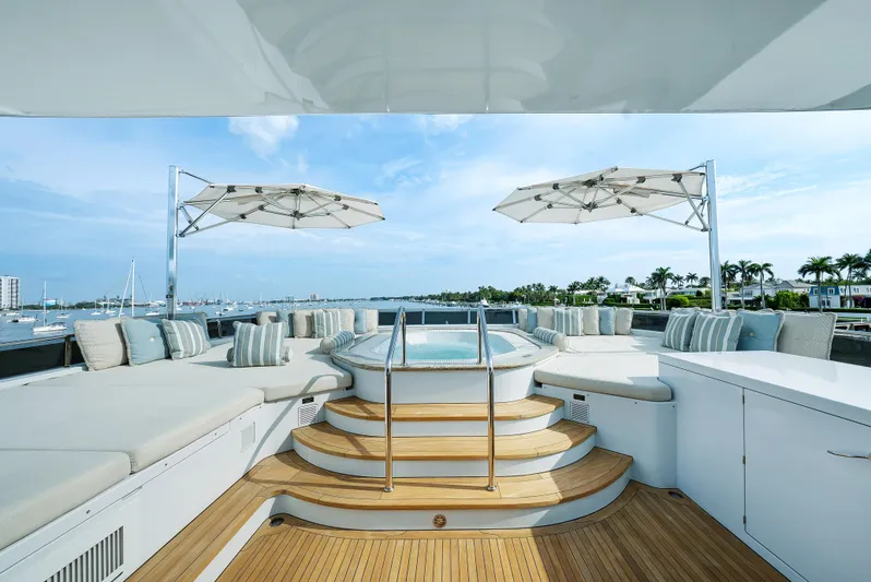 Silver Lining Yacht Photos Pics Luxurious 2016 Christensen Tri-Deck yacht deck with hot tub and seating area.