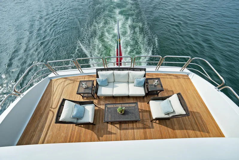 Silver Lining Yacht Photos Pics Luxurious 2016 Christensen Tri-Deck yacht deck with elegant outdoor seating and ocean view.