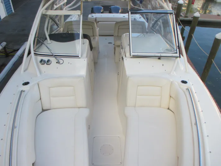  Yacht Photos Pics 2018 Grady-White Freedom 307 boat interior with spacious seating and dual consoles.