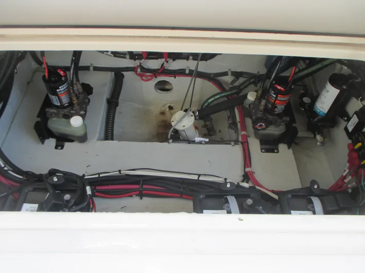  Yacht Photos Pics Engine compartment of 2018 Grady-White Freedom 307 boat, showing wiring and components.