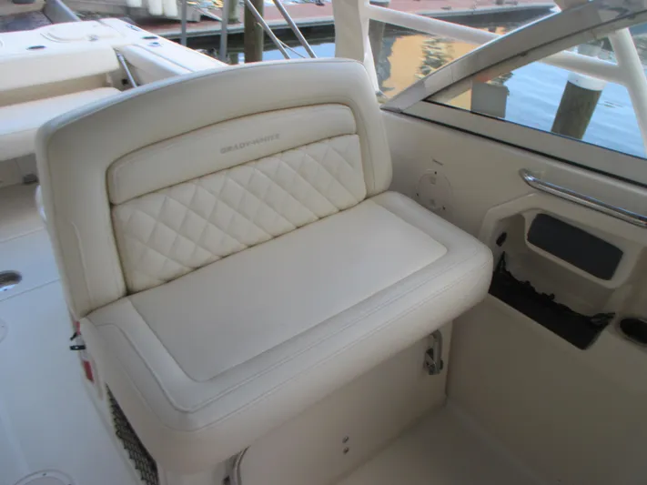  Yacht Photos Pics 2018 Grady-White Freedom 307 boat seat with quilted upholstery, dockside view.