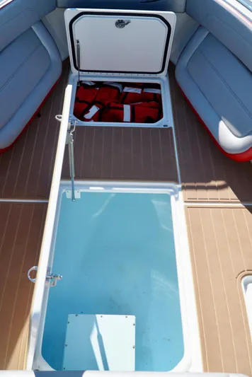  Yacht Photos Pics 2021 Nor-Tech 392 Superfish boat storage compartments with life jackets.