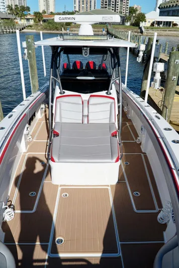  Yacht Photos Pics 2021 Nor-Tech 392 Superfish boat docked, featuring spacious deck and modern seating.