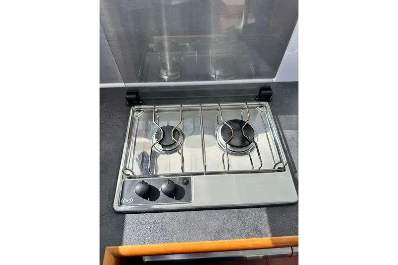 Dark Star Yacht Photos Pics Two-burner stove on 2016 Beneteau Swift Trawler 34 yacht kitchen.