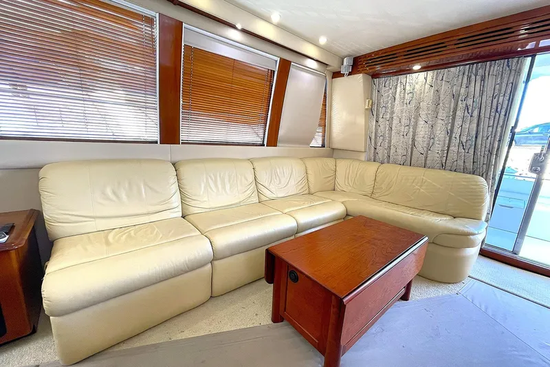 Sea Spirit Yacht Photos Pics SALON ULTRA-LEATHER SOFA TO STBD. WITH DUAL RECLINERS, END TABLE WITH STORAGE AND CUSTOM HIGH/LOW TABLE