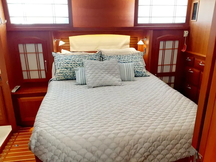 Happy Days Yacht Photos Pics Luxurious bedroom interior of 2016 Sabre 48 Salon Express yacht with elegant bedding.