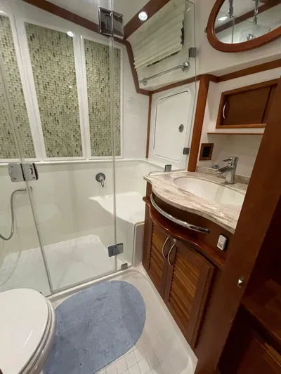 Happy Days Yacht Photos Pics Luxurious bathroom in 2016 Sabre 48 Salon Express yacht with modern fixtures and elegant design.