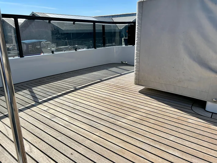  Yacht Photos Pics Deck of 2021 Van der Heijden Phantom 70 Fly yacht with wooden flooring.