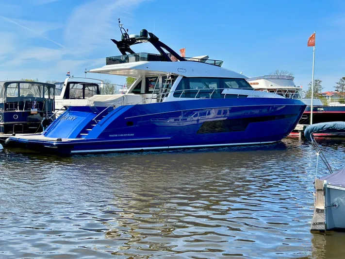  Yacht Photos Pics Luxury Van der Heijden Phantom 70 Fly yacht, 2021 model, docked in a marina.