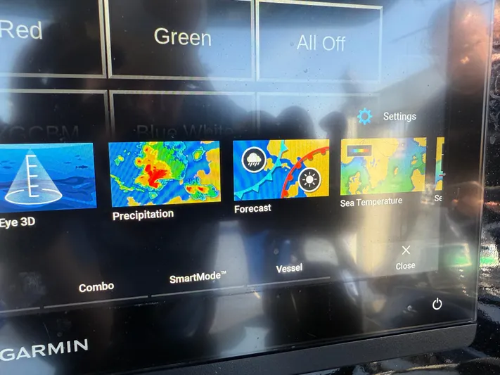 Riptide Yacht Photos Pics Garmin marine display showing weather data and settings on a Statement 380 Open, 2023 model.