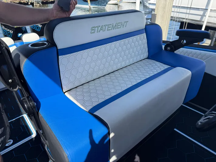 Riptide Yacht Photos Pics Blue and white seating on 2023 Statement 380 Open boat.