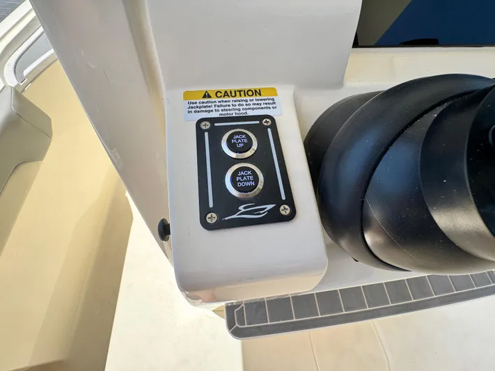  Yacht Photos Pics Control panel on a 2025 Scout 281 XSS boat with caution label.