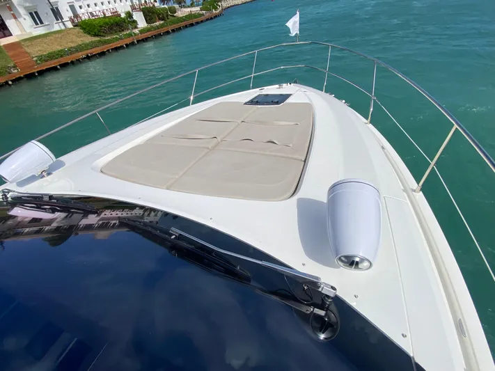 2022 Fairline Targa 50 Gt Yacht Photos Pics 2022 Fairline Targa 50 GT yacht with sun deck on turquoise water.