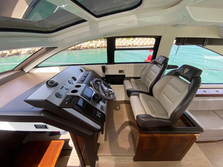 2022 Fairline Targa 50 Gt Yacht Photos Pics Interior of 2022 Fairline Targa 50 GT yacht with modern helm and seating.