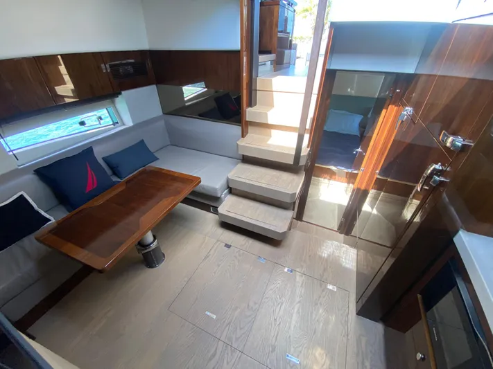 2022 Fairline Targa 50 Gt Yacht Photos Pics Luxurious interior of 2022 Fairline Targa 50 GT yacht with modern seating and wooden finishes.