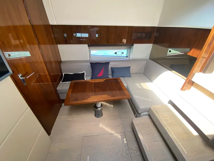 2022 Fairline Targa 50 Gt Yacht Photos Pics Luxurious interior of 2022 Fairline Targa 50 GT yacht with elegant seating and wooden accents.