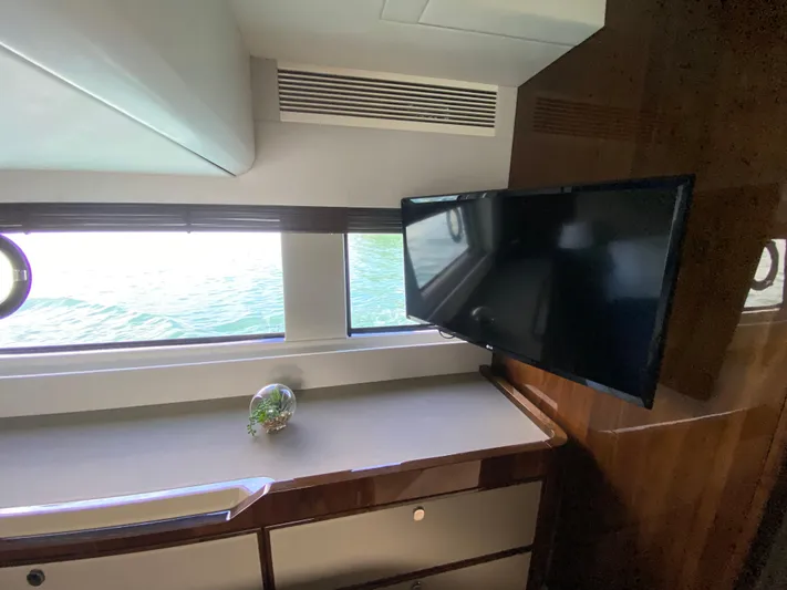 2022 Fairline Targa 50 Gt Yacht Photos Pics Interior of 2022 Fairline Targa 50 GT yacht with TV and window view.