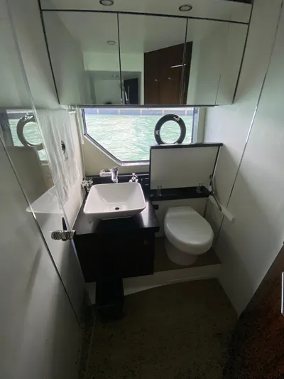 2022 Fairline Targa 50 Gt Yacht Photos Pics Modern bathroom in 2022 Fairline Targa 50 GT yacht with sink and toilet.