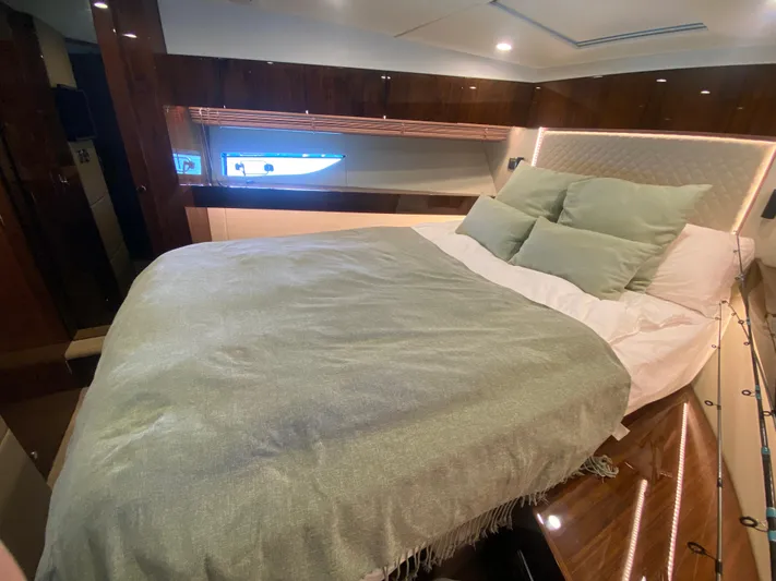 2022 Fairline Targa 50 Gt Yacht Photos Pics Luxurious bedroom interior of 2022 Fairline Targa 50 GT yacht with elegant bedding.