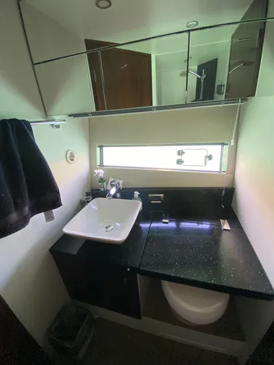 2022 Fairline Targa 50 Gt Yacht Photos Pics Modern bathroom in 2022 Fairline Targa 50 GT yacht with sleek fixtures and ample lighting.