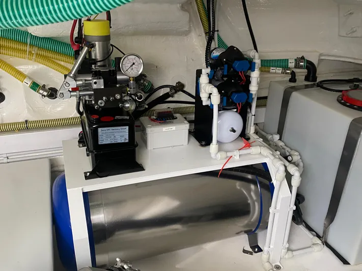 2022 Fairline Targa 50 Gt Yacht Photos Pics Engine room of 2022 Fairline Targa 50 GT yacht with mechanical equipment and piping.