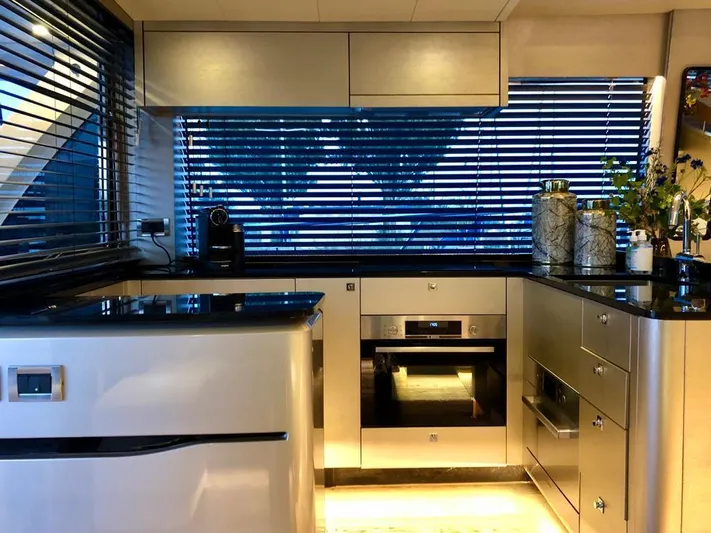  Yacht Photos Pics Luxurious kitchen interior of 2021 Van der Heijden Phantom 70 Fly yacht.