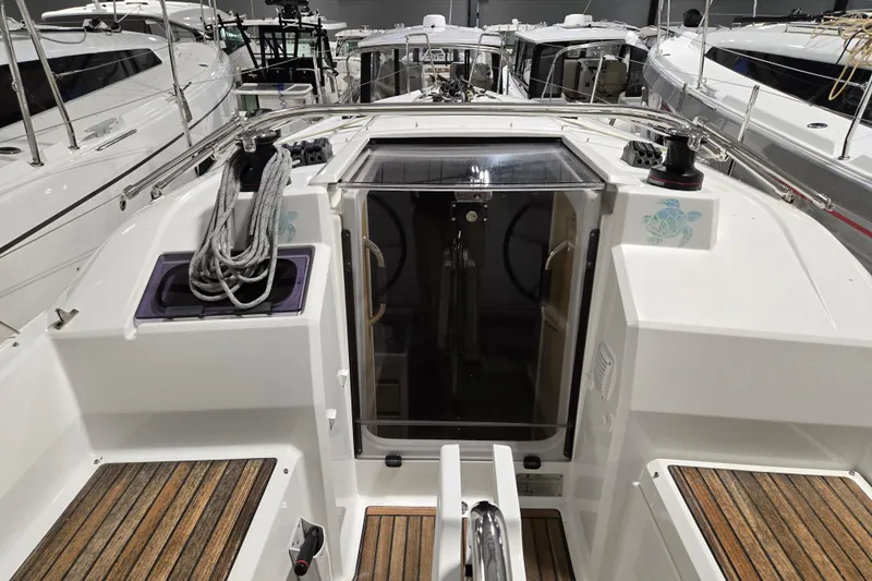 Mahalo Yacht Photos Pics Beneteau Oceanis 30.1 yacht cockpit, 2021 model, with teak flooring and modern design.